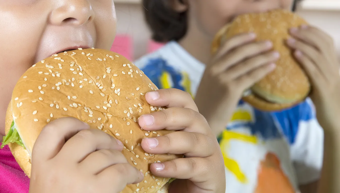 Children eating burger