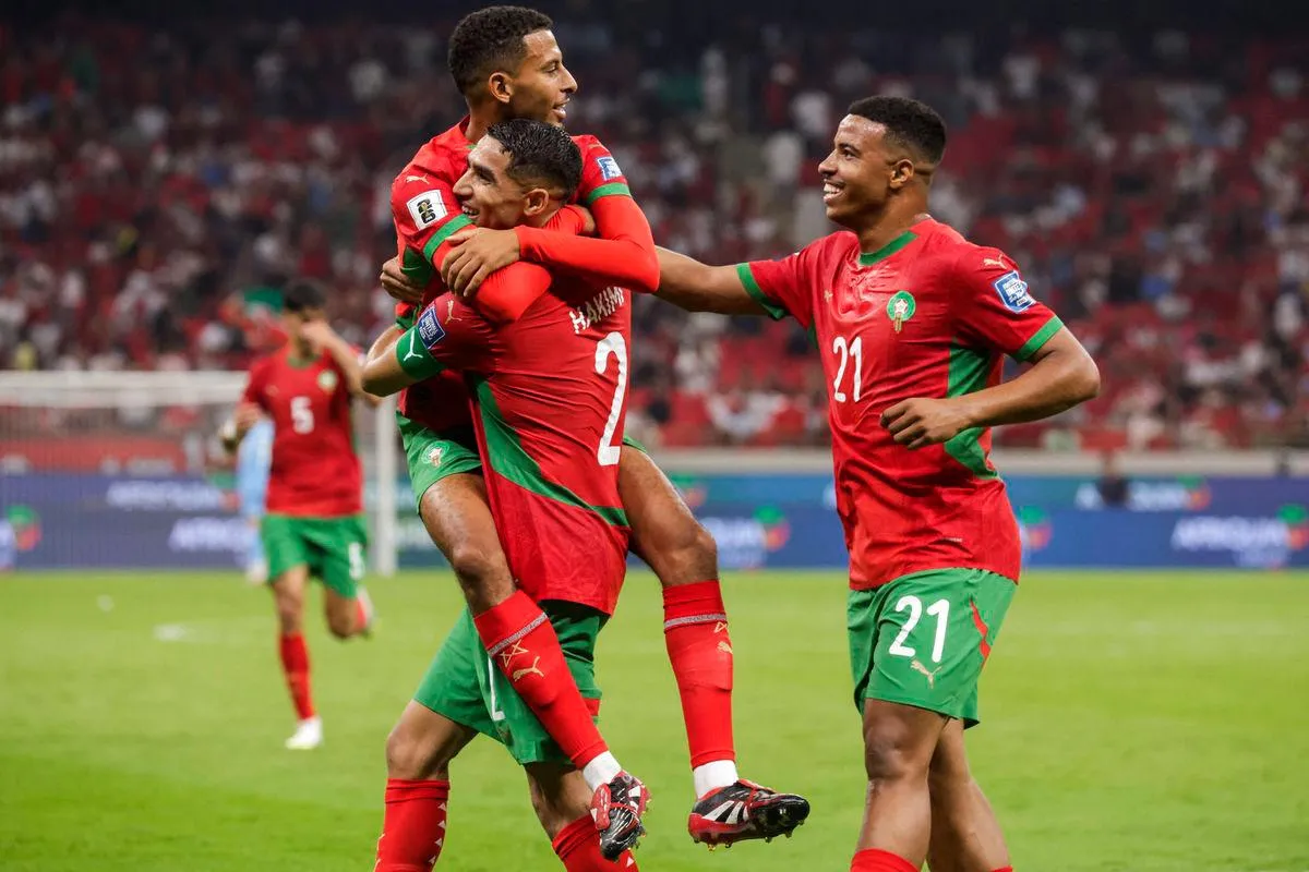 Moroccan players jubilating after 5-0 win over Niger